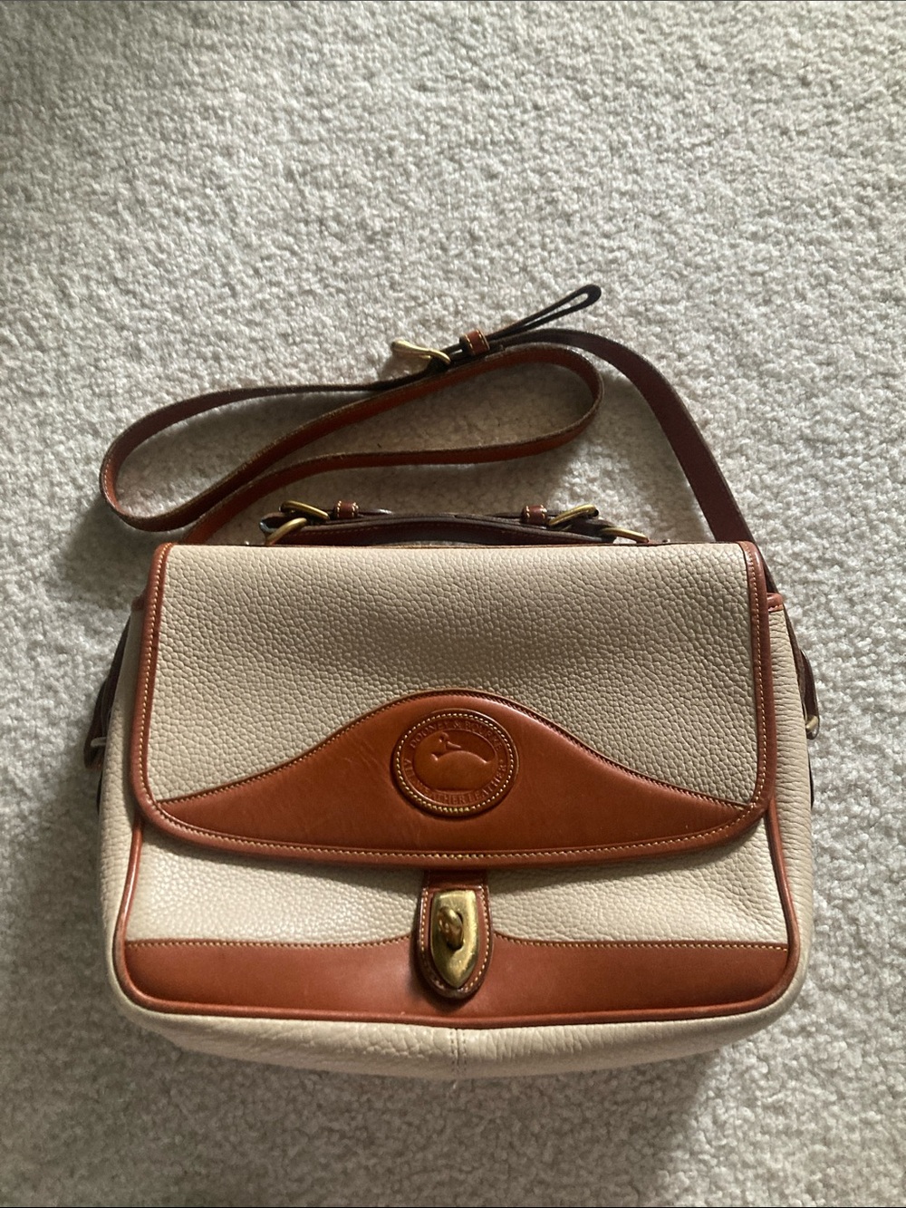 Dooney & Bourke Cream Pebbled Leather Shoulder Bag with Brown Trim